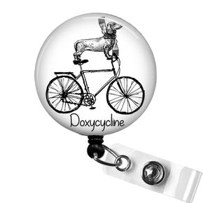 Doxycycline Pharmacy Pun Badge Reel: Dachshund on Bicycle Design - Perfect Gift for Pharmacists, Nurses, Doctors and Veterinary Professionals