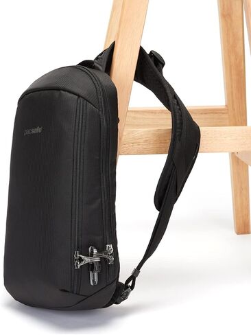 Pacsafe Vibe 325 Econyl 10L مضاد للسرقة Slingpack/Crossbody - يناسب 13 "كمبيوتر محمول ، Econyl Black in Saudi Arabia
