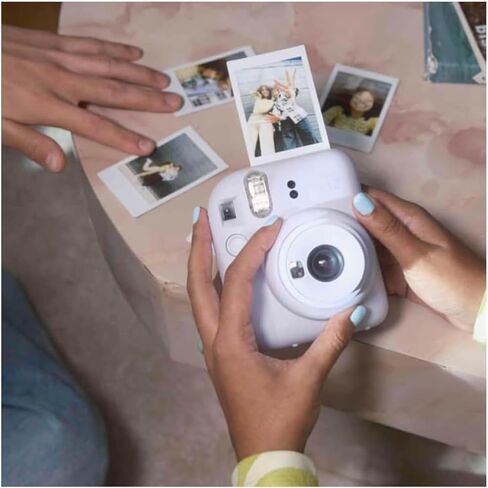 حزمة كاميرا FUJIFILM Instax Mini 12 للأفلام الفورية لعام 2025 (بنفسجي) + حقيبة حمل متوافقة + حزمة قيمة لفيلم Fuji Film (20 ورقة) + قطعة قماش للتنظيف من الألياف الدقيقة in Kuwait
