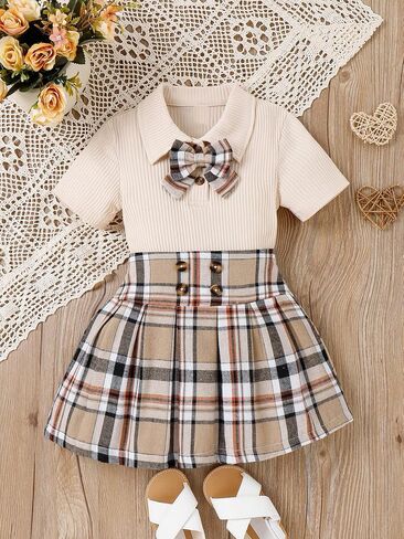OYOANGLE Girl's 2 Piece Outfits Rib Knit Bow Front Collar Tee Top and Plaid Print High Waist Pleated Skirt in Saudi Arabia