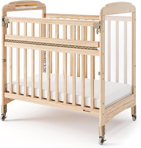 Foundations Serenity Compact Clearview Daycare Crib, Fixed Side, Durable Wood Construction, Adjustable Mattress Board, Clear End Panels. Includes 3" InfaPure Foam Mattress (Natural) in Saudi Arabia