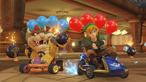 أحدث نينتندو سويتش مع Joy-Con باللون الأزرق النيون والأحمر النيون + لعبة ماريو كارت 8 الفاخرة، شاشة LCD تعمل باللمس 6.2 بوصة، 802.11AC WiFi، بلوتوث 4.1 - أحمر وأزرق + AllyFlex 128GB Micro SD (متجدد) in Kuwait