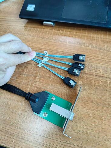 Mini SAS HD SFF-8644 أنثى مع مزلاج إلى 4X كابل SATA 7Pin، كابل بيانات القرص الصلب للخادم عالي السرعة 12 جيجابت في الثانية - متوافق مع وحدة تحكم RAID، محطة العمل، توسيع التخزين (0.5 متر/19.68 بوصة) in Saudi Arabia