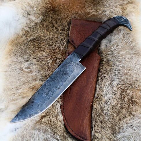 سكين Odin's Raven Norse Viking على شكل 10.3 بوصة - شفرة من الفولاذ الكربوني مقاس 6.5 بوصة مصنوعة يدويًا، ومقبض رأس Raven's وغمد جلدي - طراز Seax فريد من نوعه من العصور الوسطى - سكين نورس للصيد والتخييم in Saudi Arabia