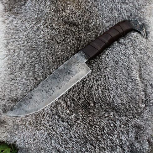 سكين Odin's Raven Norse Viking على شكل 10.3 بوصة - شفرة من الفولاذ الكربوني مقاس 6.5 بوصة مصنوعة يدويًا، ومقبض رأس Raven's وغمد جلدي - طراز Seax فريد من نوعه من العصور الوسطى - سكين نورس للصيد والتخييم in Saudi Arabia