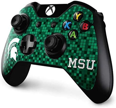 ملصق Skinit المخصص للألعاب متوافق مع وحدة تحكم Xbox One - تصميم بكسل رقمي مرخص رسميًا من College Michigan State Spartans in Kuwait