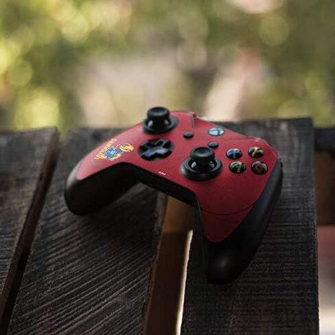 ملصق Skinit المخصص للألعاب متوافق مع وحدة تحكم Xbox One Elite - تصميم College Jayhawks KU المرخص رسميًا in Kuwait
