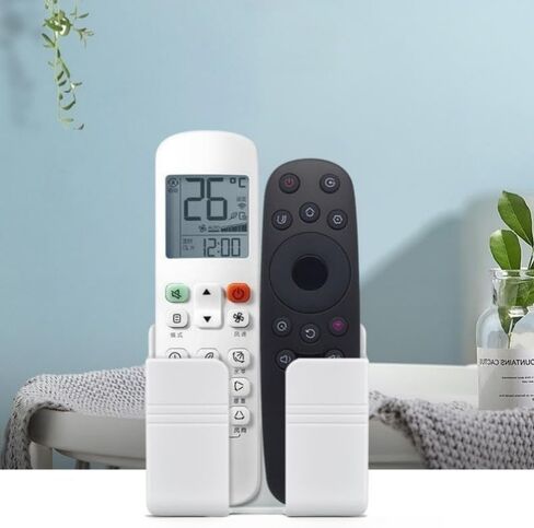 A Wall-Mounted Phone Holder Made of Adhesive PC Material, No Drilling Required, Remote Control Storage Rack, White in Saudi Arabia