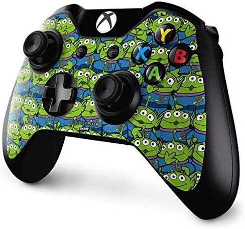 ملصق Skinit المخصص للألعاب متوافق مع وحدة تحكم Xbox One - تصميم Disney Toy Story Alien Collage المرخص رسميًا in Kuwait