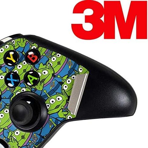 ملصق Skinit المخصص للألعاب متوافق مع وحدة تحكم Xbox One - تصميم Disney Toy Story Alien Collage المرخص رسميًا in Kuwait