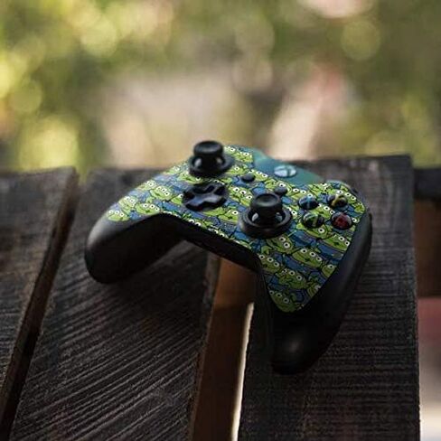 ملصق Skinit المخصص للألعاب متوافق مع وحدة تحكم Xbox One - تصميم Disney Toy Story Alien Collage المرخص رسميًا in Kuwait