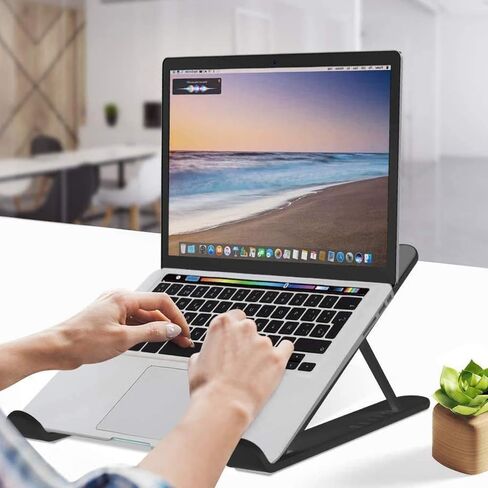 حامل كمبيوتر محمول محمول - قابل للطي وقابل لتعديل الارتفاع، تصميم تبريد سفلي، ABS سميك مضاد للانزلاق + سيليكون + محور حديدي، مثالي لأجهزة الكمبيوتر والأجهزة اللوحية، للاستخدام المنزلي والمكتبي، أسود in Saudi Arabia