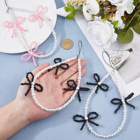 4Pcs Elegant Beaded Pearl Phone Charms Strap 2 Colors Bow Aesthetic Keychain Universal Cell Phone Beaded Lanyard Wrist Strap for Bag Camera Pendants Decor Pink and Black in Saudi Arabia