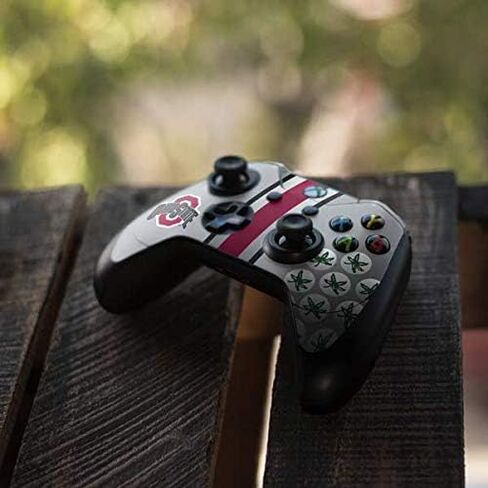 ملصق Skinit المخصص للألعاب متوافق مع وحدة تحكم Xbox One Elite - تصميم باكيز من جامعة ولاية أوهايو المرخص رسميًا in Saudi Arabia