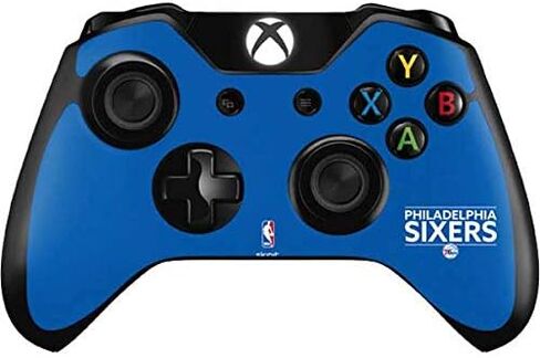 ملصق Skinit المخصص للألعاب متوافق مع وحدة تحكم Xbox One - مرخص رسميًا من NBA Philadelphia 76ers Standard - تصميم أزرق in Kuwait