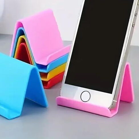 Multifunctional Foldable Phone Holder – Universal Adjustable Desktop Stand for Tablets & Phones –Pink Plastic Holder for Bedside or Office Use in Saudi Arabia
