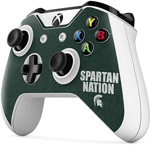 ملصق Skinit المخصص للألعاب متوافق مع وحدة تحكم Xbox One S - تصميم مرخص رسميًا من كلية ولاية ميشيغان وجامعة ولاية سبارتانز in Kuwait