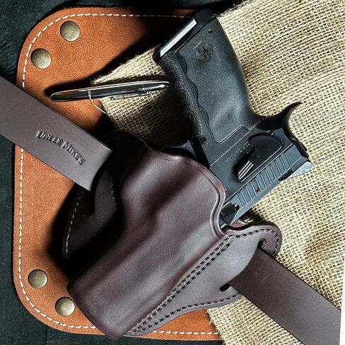 Uncle Mike's Sig P320 Holster, OWB Holster fits +30 Guns Including Beretta 92, 92fs, M9, Ruger American, Security-9, Sig P320, P220, Springfield XDM, HK VP Tactical, VP40, HK45, Walther PPQ & CZ 75 in Saudi Arabia