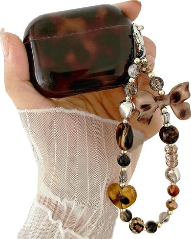 جراب JANDM متوافق مع AirPods 4، غطاء ناعم من مادة TPU بنية اللون على شكل سلحفاة كهرماني نمط الفهد للنساء والفتيات مع سلسلة مفاتيح ساحرة بحزام لطيف لـ AirPods 4 in Kuwait