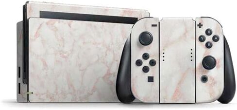 ملصق Skinit المخصص للألعاب متوافق مع حزمة Nintendo Switch - تصميم رخام باللون الأبيض والذهبي الوردي in Saudi Arabia