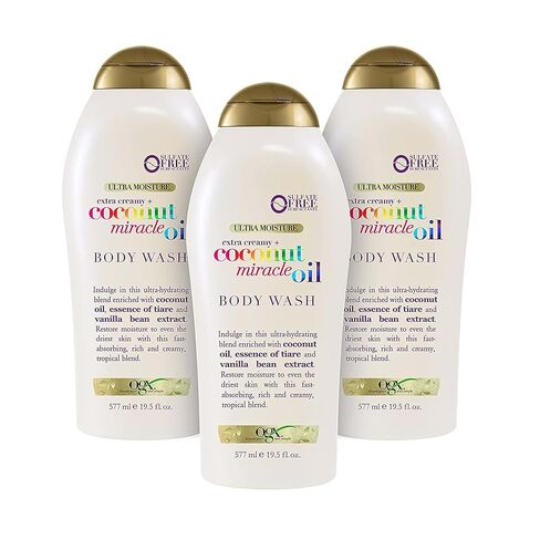 OGX كريمي للغاية + غسول الجسم فائق الترطيب بزيت جوز الهند المعجزة، 19.5 أونصة سائلة in Kuwait