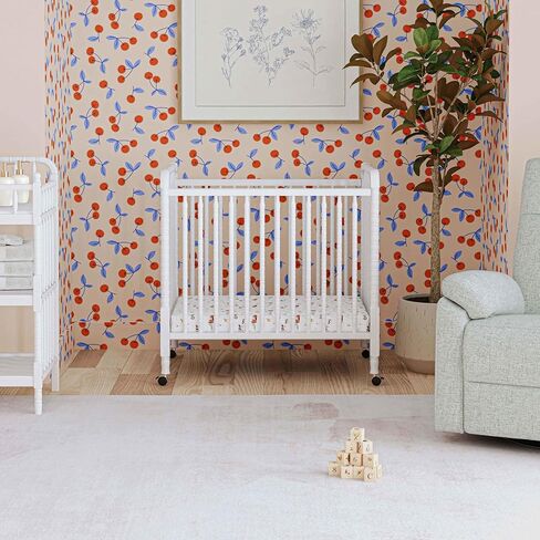 Davinci Jenny Lind 3-in-1 Convertible Mini Crib in White, Removable Wheels, Greenguard Gold Certified in Saudi Arabia