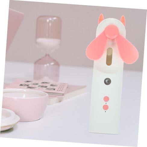 Rechargeable Mini USB Cooling Fan with Mist Spray Portable Handheld Fan for Travel and Outdoor Use Quiet Personal Cooler in Pink in Saudi Arabia