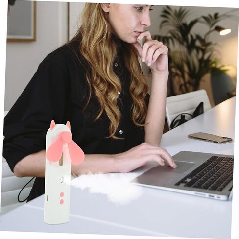 Rechargeable Mini USB Cooling Fan with Mist Spray Portable Handheld Fan for Travel and Outdoor Use Quiet Personal Cooler in Pink in Saudi Arabia