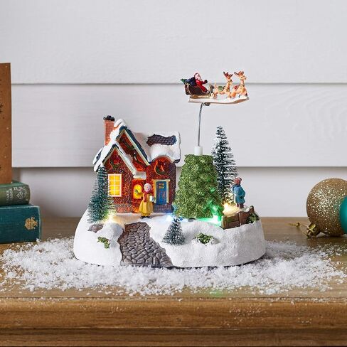 Lights4fun, Inc. Christmas Village Popcorn Stand with Popping Corn Animated Pre-Lit LED Battery Operated Light Up Holiday Decoration in Saudi Arabia