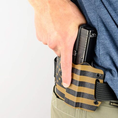 حافظات OWB سوداء مع حلقات حزام مدمجة لأكثر من 150 مسدسًا مختلفًا. الإصدارات اليسرى واليمنى المتاحة. in Saudi Arabia