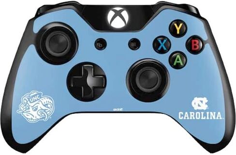 ملصق Skinit المخصص للألعاب متوافق مع وحدة تحكم Xbox One - تصميم تميمة مرخص رسميًا من كلية نورث كارولينا in Kuwait