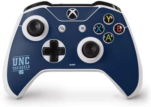 غلاف Skinit المخصص للألعاب متوافق مع وحدة تحكم Xbox One S - تصميم Tar Heels مرخص رسميًا من جامعة نورث كارولينا in Saudi Arabia