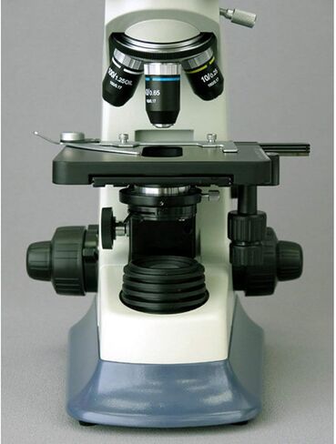 AmScope T590A Professional Compound Trinocular Microscope, WF10x and WF16x Eyepieces, 40X-1600X Magnification, High-Contrast Objectives, Brightfield, Halogen Illumination, Abbe Condenser, Double-Layer Mechanical Stage, Anti-Mold, 110V in Saudi Arabia