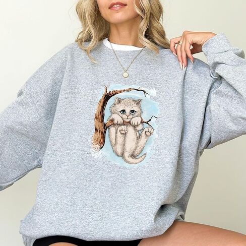 Opalitee Winter Kitten Unisex Sweatshirt Crewneck Pullover Cat Hanging from a tree Sweater Cat Unisex Cotton T-Shirt, in Saudi Arabia