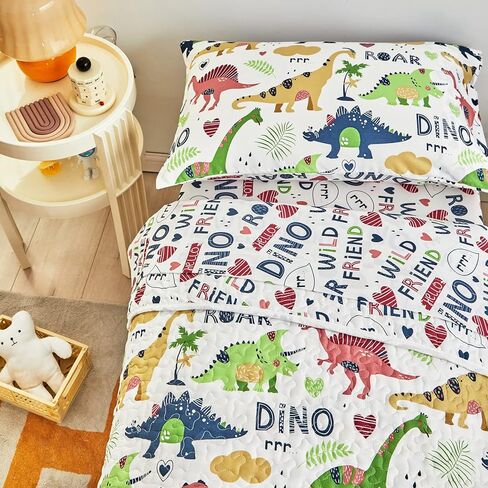 طقم سرير مبطن للأطفال الصغار مكون من 4 قطع صيفي أبيض ملون على شكل ديناصور للأطفال الصغار يتضمن مجموعة لحاف مقاس طفل صغير وملاءة مسطحة وملاءة جاهزة وكيس وسادة in Kuwait