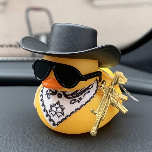 A Yellow Toy Duck,Wearing A Black Cowboy Hat and A Yellow Scarf,Carrying A Gun On Its Back. Auto Parts,Exterior Decorations,Party Decorations in Saudi Arabia
