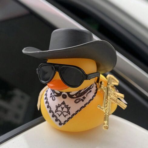 A Yellow Toy Duck,Wearing A Black Cowboy Hat and A Yellow Scarf,Carrying A Gun On Its Back. Auto Parts,Exterior Decorations,Party Decorations in Saudi Arabia