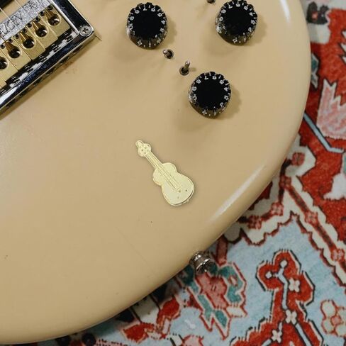 مجموعة الآلات الموسيقية الذهبية الصغيرة، 24 قطعة من زخارف الآلات الموسيقية المصغرة لعيد الميلاد، بيت الدمى، الجيتار، البوق، الترومبون، الساكسفون، ديكور لحفلات شجرة عيد الميلاد، هدايا يدوية الصنع in Kuwait