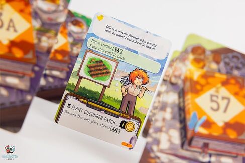 لعبة لوحة Asmodee Cozy Stickerville - لعبة استراتيجية سردية لبناء القرية ورواية القصص، متعة مناسبة للعائلة للأطفال والكبار، للأعمار من 8 سنوات فما فوق، 1-6 لاعبين، وقت لعب لمدة 30 دقيقة in Kuwait