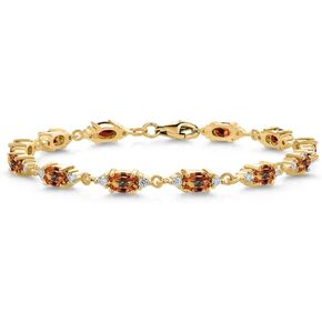 Gem Stone King 18K Yellow Gold Plated Silver Ecstasy Mystic Topaz and White Moissanite Tennis Bracelet For Women (6.91 Cttw, Gemstone Birthstone, Oval 6X4MM, 6.5 Inch)