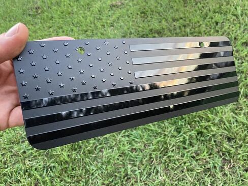 لوحة ترخيص معدنية منقوشة بعلم أسود من LFPartS USA (12 بوصة × 4 بوصة (نصف حجم)، أسود) فتحتان in Kuwait