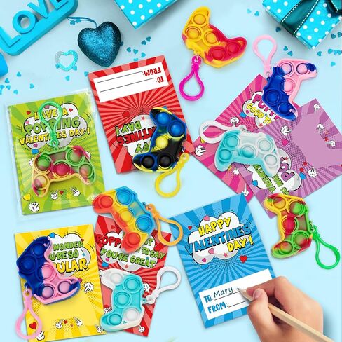 Duchong Valentines Cards for Kids Classroom, 24 Packs Game Shape Pop Fidget Keychains Bulk, Class Valentines Gifts for Kids, School Exchange Prizes & Party Favors for Boys Girls in Saudi Arabia