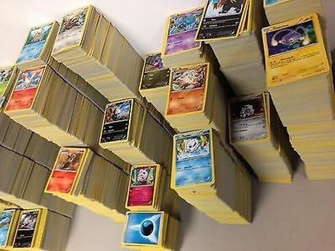 Pokemon 50 +2 Card Lot w/Rares، Commons، Uncommons (مضمونة 1 Holo) in Kuwait