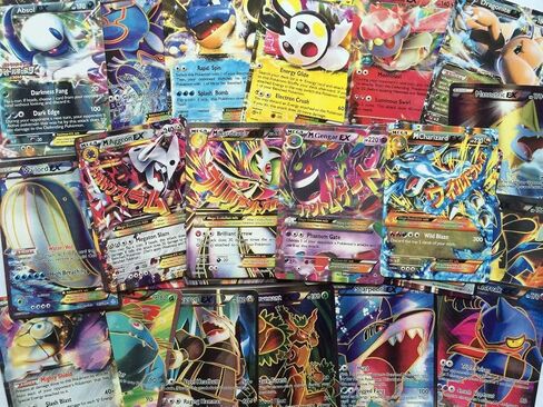 Pokemon 50 +2 Card Lot w/Rares، Commons، Uncommons (مضمونة 1 Holo) in Kuwait
