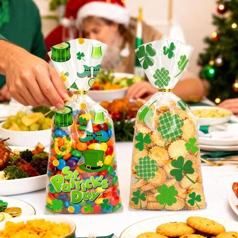 أكياس حلوى السيلوفان لعيد القديس باتريك من BIWONUI - 100 قطعة من حقائب هدايا الحفلات الخضراء لعيد القديس باتريك مع حقيبة بلاستيكية برباط ملتوي لحلوى الفشار والكوكيز والوجبات الخفيفة ومستلزمات حفلات العطلات in Kuwait