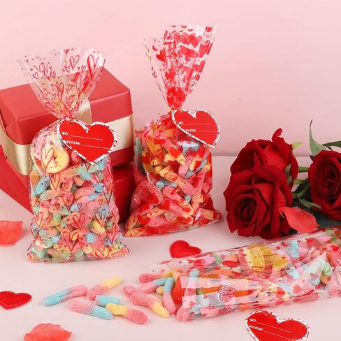 Aodaer 200 Pieces Valentine Cellophane Bags Plastic Valentines Party Treat Bags Clear Candy Gift Bags with 200 Twist Ties 50 Gift Tags, Assorted Style for Valentines Party Favors, 5 x 11 Inch in Saudi Arabia