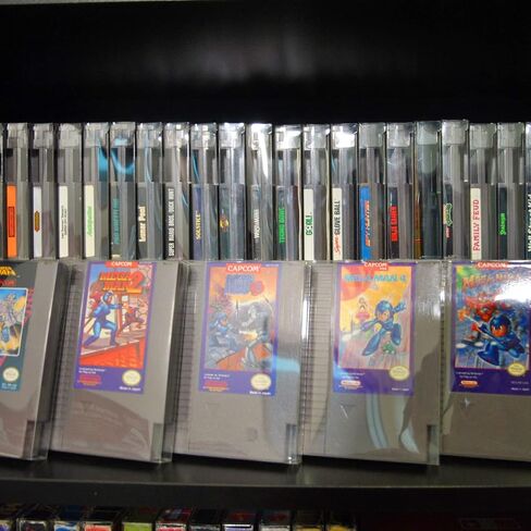 واقي خرطوشة ألعاب الفيديو NES الكلاسيكي متوافق مع عربة ألعاب Nintendo NES - واقي ألعاب الفيديو PET مقاس 0.40 مم متوافق مع Duck Hunt وAdventure Island وMega Man وPunch Out (عبوة من 25 قطعة) in Saudi Arabia
