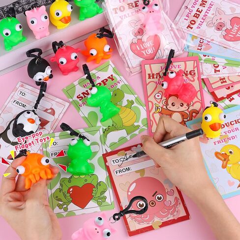 28 حزمة من بطاقات عيد الحب للأطفال في الفصل الدراسي، هدايا عيد الحب للأطفال في المدرسة مع سلسلة مفاتيح على شكل حيوانات عين البوب، مجموعة هدايا عيد الحب لفصل عيد الحب، بطاقات تبادل هدايا الحفلات in Kuwait