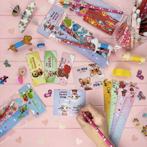 Valentines Day Gifts for Kids, 28 Pack Valentine Classroom Party Favors with Cards School Class Bulk Prize for Boys Girls Toddlers Friends Exchange Gift with Pencils Stickers Erasers in Saudi Arabia