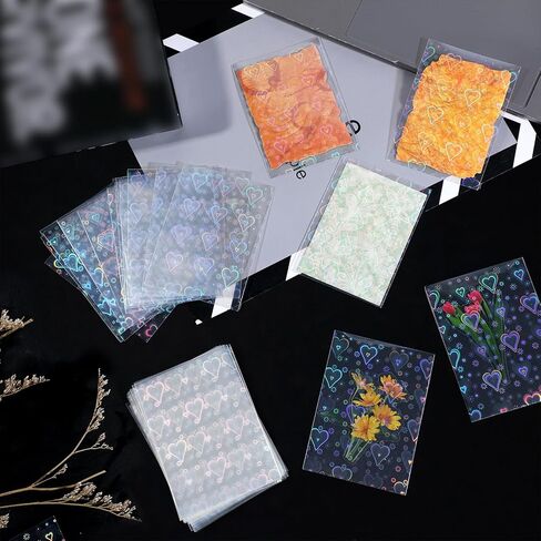 100PCS Laser Flashing Card Sleeves, Love Heart Laser Flashing Holographic Card Sleeves, Photocard Sleeve with Holographic Foil Cover, Laser-Flashing Trading Card-Protector for Photo Cards (65x90mm) in Saudi Arabia